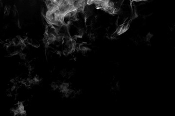 Abstract powder or smoke effect isolated on black background
