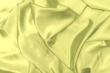 Fototapeta premium Yellow satin fabric texture soft blur background