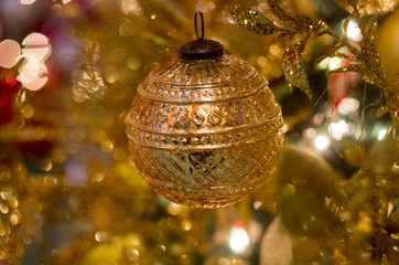 christmas tree decoration on golden background