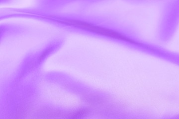 Fototapeta na wymiar proton purple satin fabric texture soft blur background