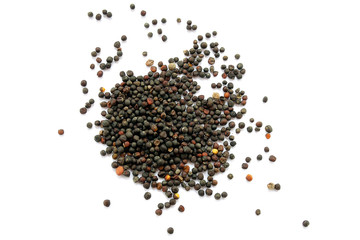 Dried canola seeds isolated on white. Bunch of rape seeds on a white background. View from above....