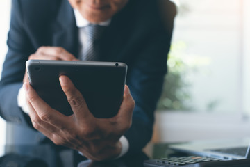 Businessman using tablet