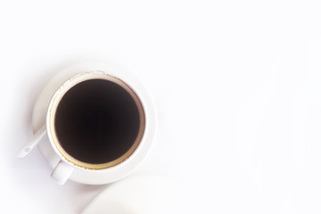 Fototapeta na wymiar hot Espresso coffee in mug on White table background. top view.