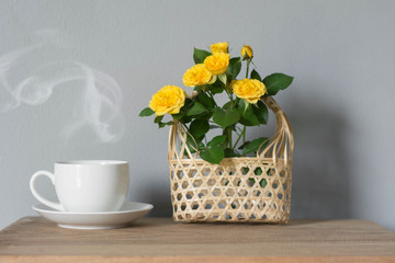 Coffee espresso on wood table nature background in garden,warm tone