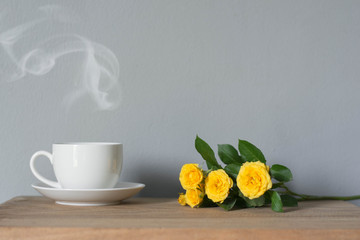 Coffee espresso on wood table nature background in garden,warm tone