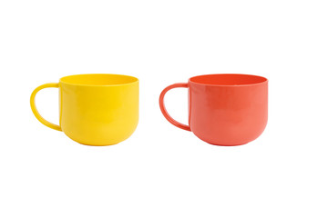 Yellow and red plastic cups on a white background.