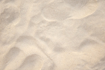 Naklejka na ściany i meble sand on the beach background. Top view