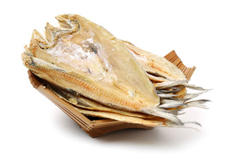 Dried salted fishes on white background