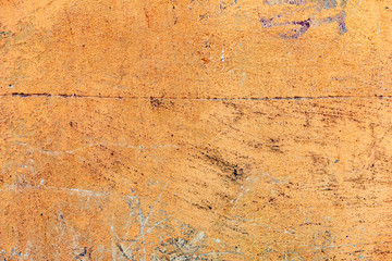 Texture of a concrete wall with cracks and scratches which can be used as a background