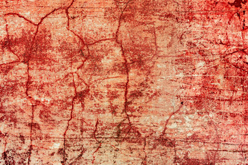 Texture of a concrete wall with cracks and scratches which can be used as a background