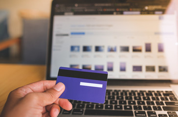 Comfort e-commerce shopping. Royalty high quality free stock photo image of shopping online and payment by credit card. Using laptop and mobile phone to online shopping and pay by credit card