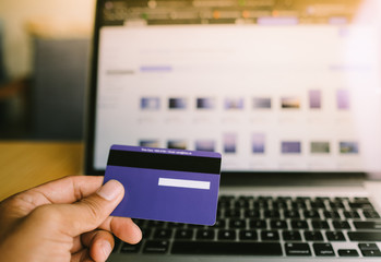 Comfort e-commerce shopping. Royalty high quality free stock photo image of shopping online and payment by credit card. Using laptop and mobile phone to online shopping and pay by credit card