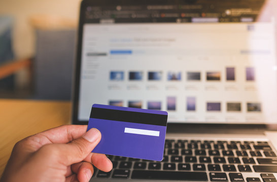 Comfort e-commerce shopping. Royalty high quality free stock photo image of shopping online and payment by credit card. Using laptop and mobile phone to online shopping and pay by credit card