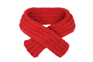Small red knitted scarf isolated on a white background. Handmade woolen neckwear. Closeup. Copy...
