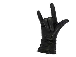 Hand in slightly worn black leather glove shows goat sign, devil horns or" I love you" gesture, isolated on a white background. Copy space