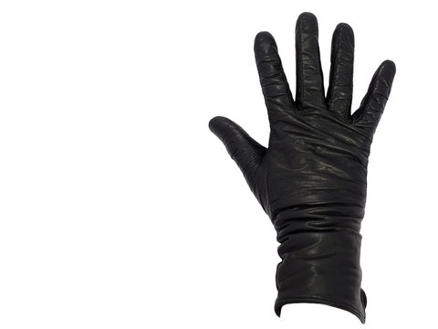 Hand in black leather glove with fingers spread isolated on a white background. Back side. Voting or greeting gesture. Copy space