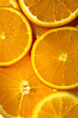 slice  of bright color oranges. Texture background ripe juicy fruits oranges. Product Image Tropical Oranges Fruit