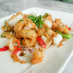 Fried squids or octopus (calamari) with chilli and garlic