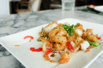 Fried squids or octopus (calamari) with chilli and garlic