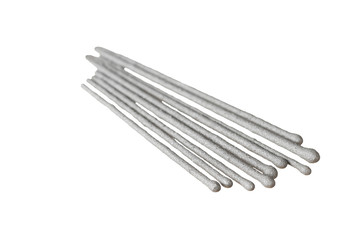 Scattered many gray sparklers, bengal lights on aluminum stick isolated on white background without shadow. Close-up
