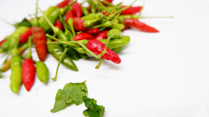 bunch of red peppers isolated on white