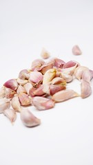  Garlic cloves on white background