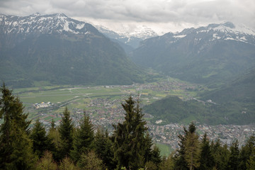 Charming panorama view of interlaken town and alpine mountains from harder kulm for background with copy space