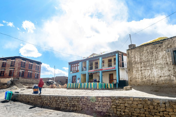 Fototapeta premium Spiti Valley, Himachal Pradsh, India, December 2019 - World highest restaurant standing alone far away in Himalayan mountain against blue sky clouds background. Feel Surround silence in nature.