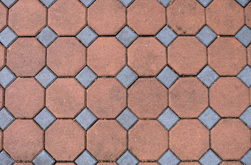 Close-up top view hexagonal bricks street background, Octagon paving brick sidewalk texture. highly detailed resolution copy space & surface for any design.