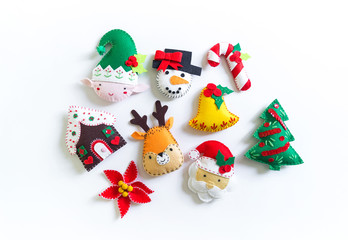 Toy made of felt to decorate the Christmas tree. New Year home decor.