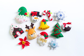 Toy made of felt to decorate the Christmas tree. New Year home decor.