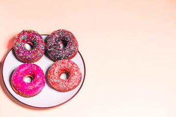 Group of glazed donuts on background