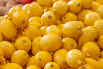 small shop. there is a yellow lemon on the window. close-up. texture.