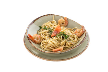 fresh spaghetti pasta with prawn on grey plate isolated on white background