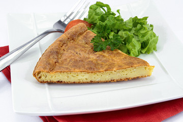 pieces of cheese quiche on a plate