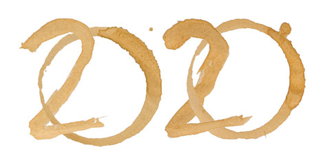 Word 2020 Alphabet is made of Coffee stains isolated on white background