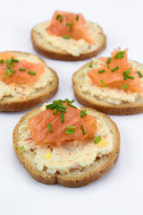 toast with smoked salmon on a white background