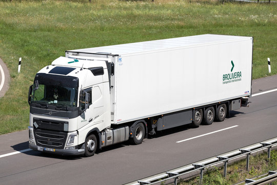 WIEHL, GERMANY - JUNE 25, 2019: Broliveira Volvo truck with temperature controlled trailer on motorway.