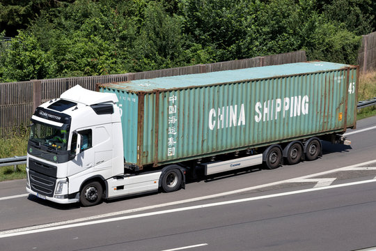 WIEHL, GERMANY - JUNE 25, 2019: Volvo FH truck with China Shipping container on motorway.