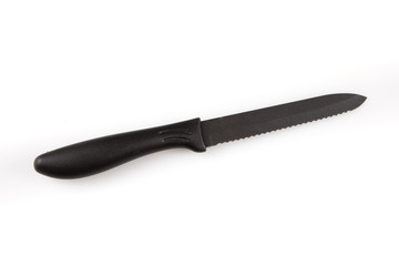 Bread knife real black isolated against white background