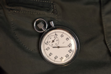 old pocket watch on dark background
