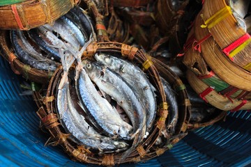 Streamed fish in the bamboo basket for selling in the morning market