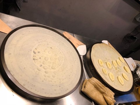 Making of crepes pancakes in the market