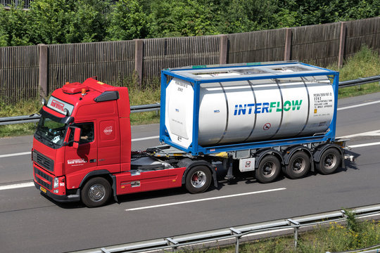 WIEHL, GERMANY - JUNE 25, 2019: Siem Stout Volvo FH truck with Interflow tank container on motorway.