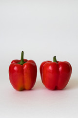 red bell Bulgarian peppers on white background 