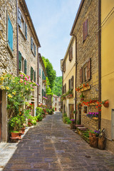 Fototapeta premium Italian street in a small provincial town of Tuscan