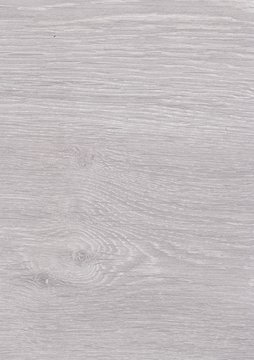 A Regular wood texture with vertical and horizontal lines. Subtle grey wooden background for natural banner. Timber surface closeup. Natural material for banner template.
