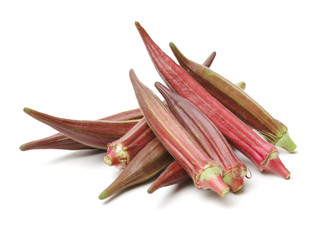 Red okra on white background