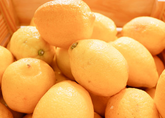 Fresh organic lemon in wooden box