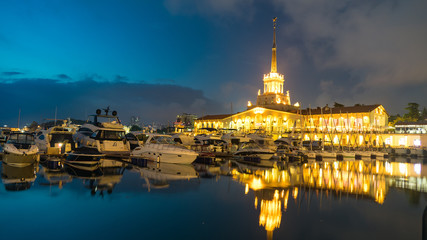 Fototapeta na wymiar Beautiful building of Sea Port of Sochi at night, Krasnodar Krai, Russia.